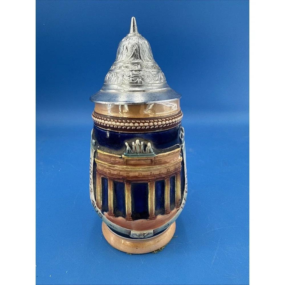 Vtg German relief ceramic souvenir beer stein w/ hinged pewter-tone metal lid,